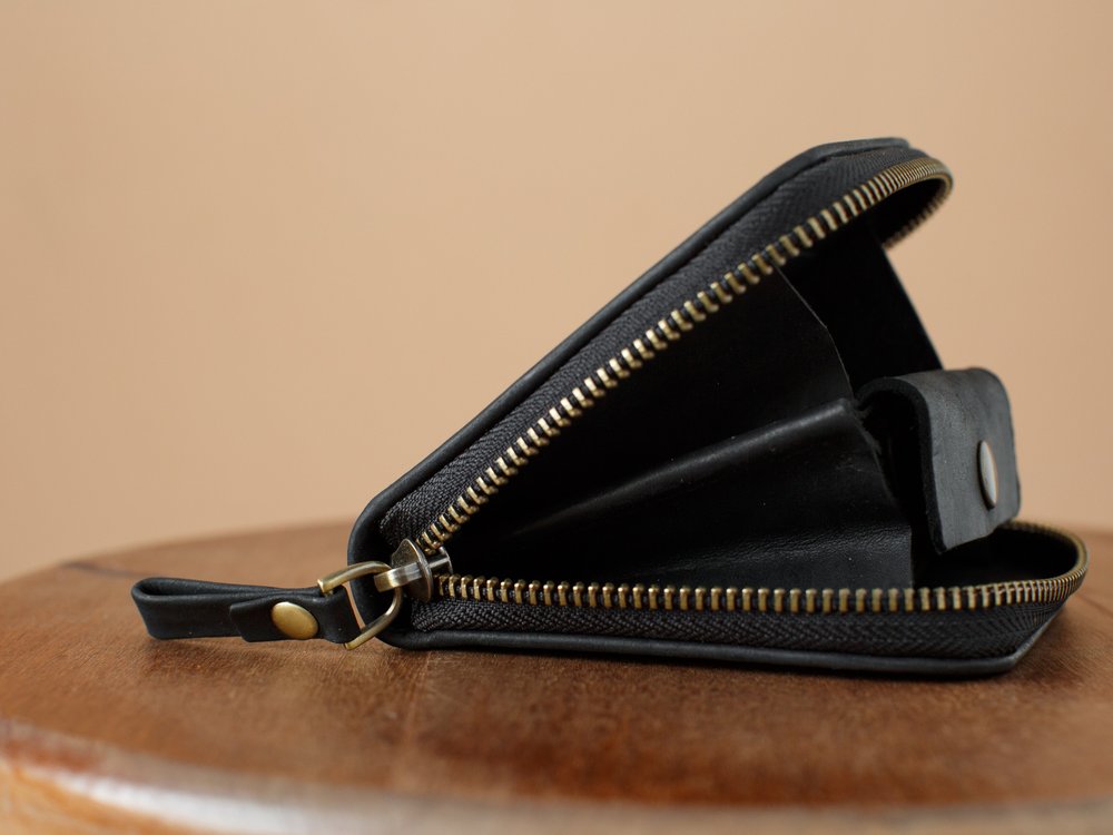 Компактний гаманець ручної роботи арт. 216 Petty чорного кольору з натуральної вінтажної шкіри 216petty_brown Boorbon