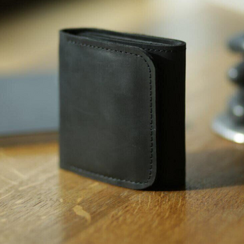 Чоловічий гаманець на кнопці ручної роботи арт. 104 чорного кольору з натуральної вінтажної шкіри