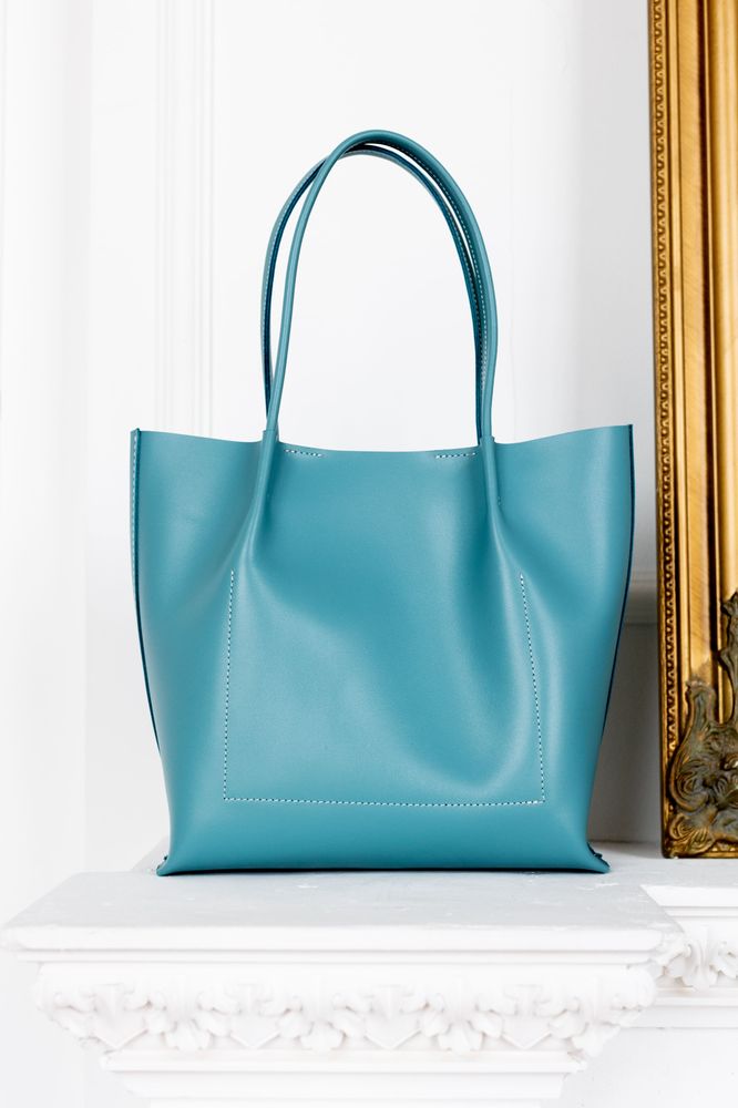 Об'ємна сумка шоппер арт. Sierra S у блакитному кольорі із натуральної шкіри з легким глянцевим ефектом Sierra_blue Boorbon