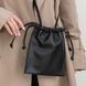 Мініатюрна сумка крос-боді на затяжках арт. Pouch з натуральної гладкої м'якої шкіри чорного кольору pouch_black_bronx фото 1 Boorbon